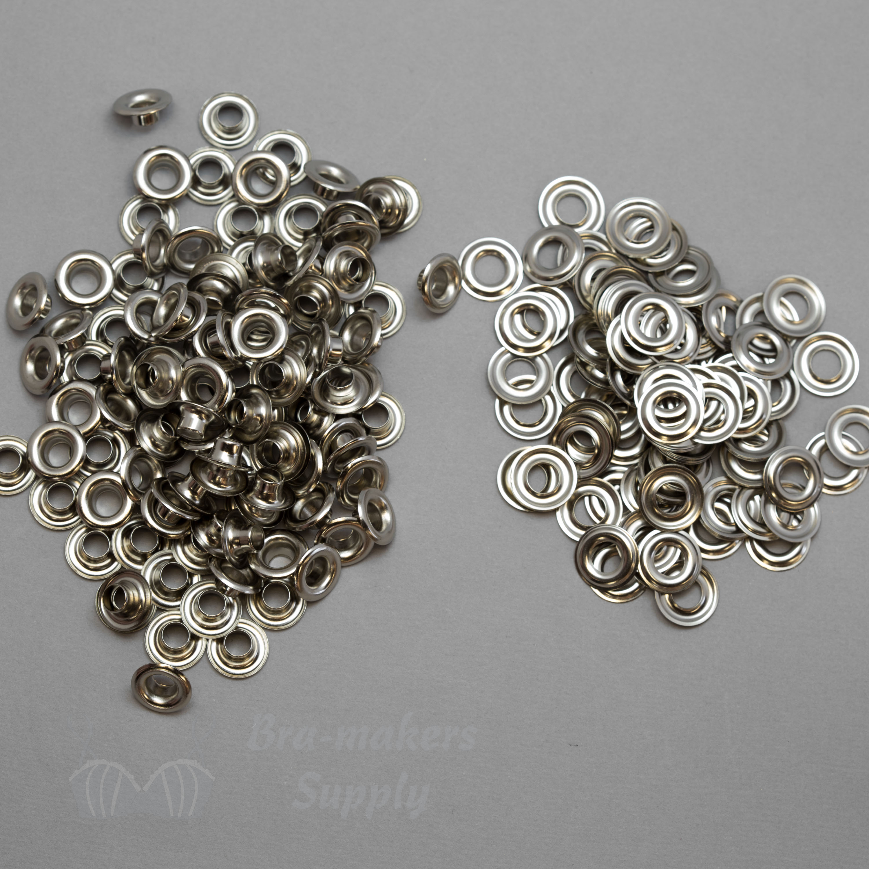 metal corset grommets or two part eyelets BG-00 nickel from Bra-Makers Supply package of 144 shown