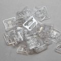 plastic nursing bra strap clips CN-800 clear from Bra-Makers Supply bulk bag of 100 clips shown