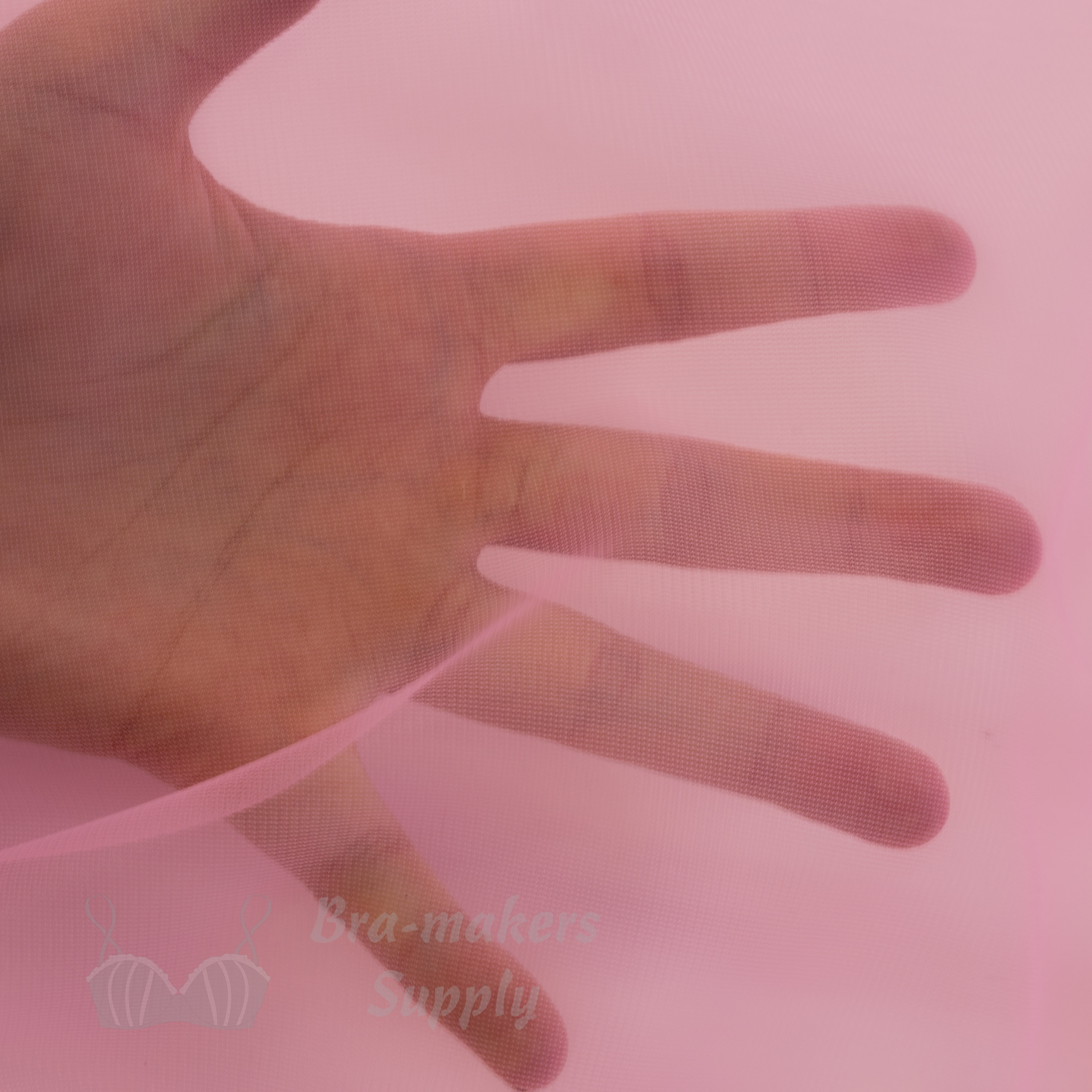 https://www.braandcorsetsupplies.com/wp-content/uploads/2016/09/15-denier-sheer-nylon-fabric-FL-15-bubblegum-pink-from-Bra-Makers-Supply-hand-shown.jpg