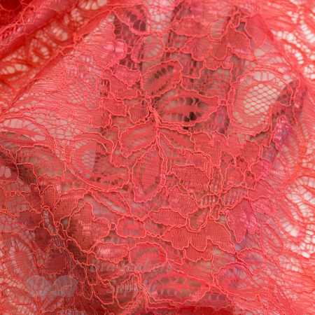 coral coloured lace fabric